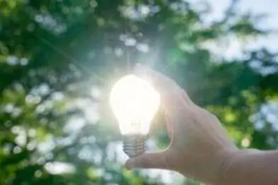 Yellow post-it with light bulb